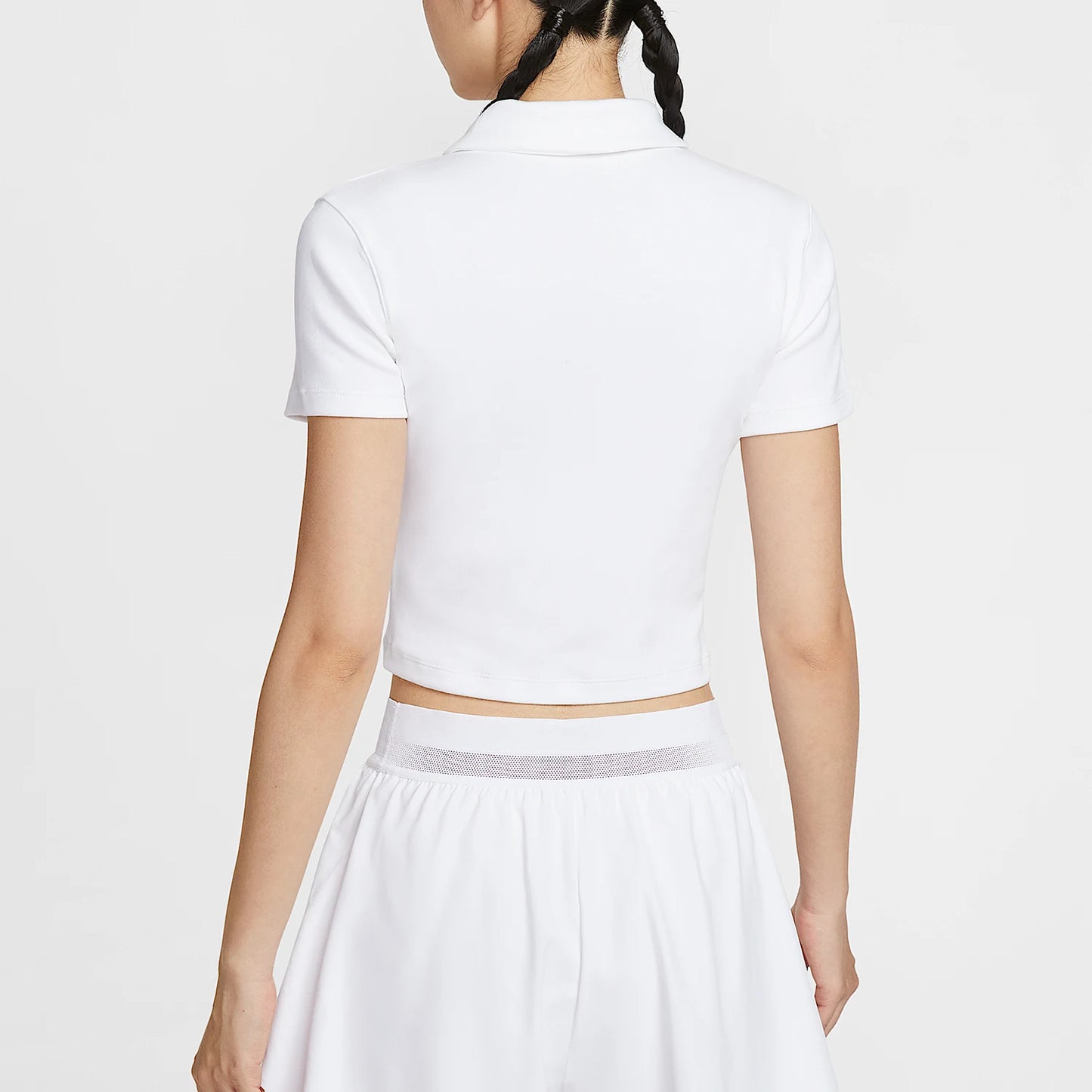 Genuine Nike women's polo shirt, cropped style.