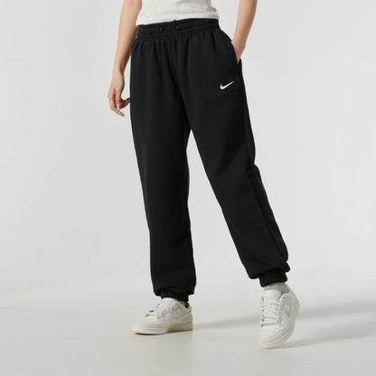 Nike women's athletic pants, ideal for outdoor activities, workouts, and physical exercise. Lined with fleece, warm, and with knit cuffs.