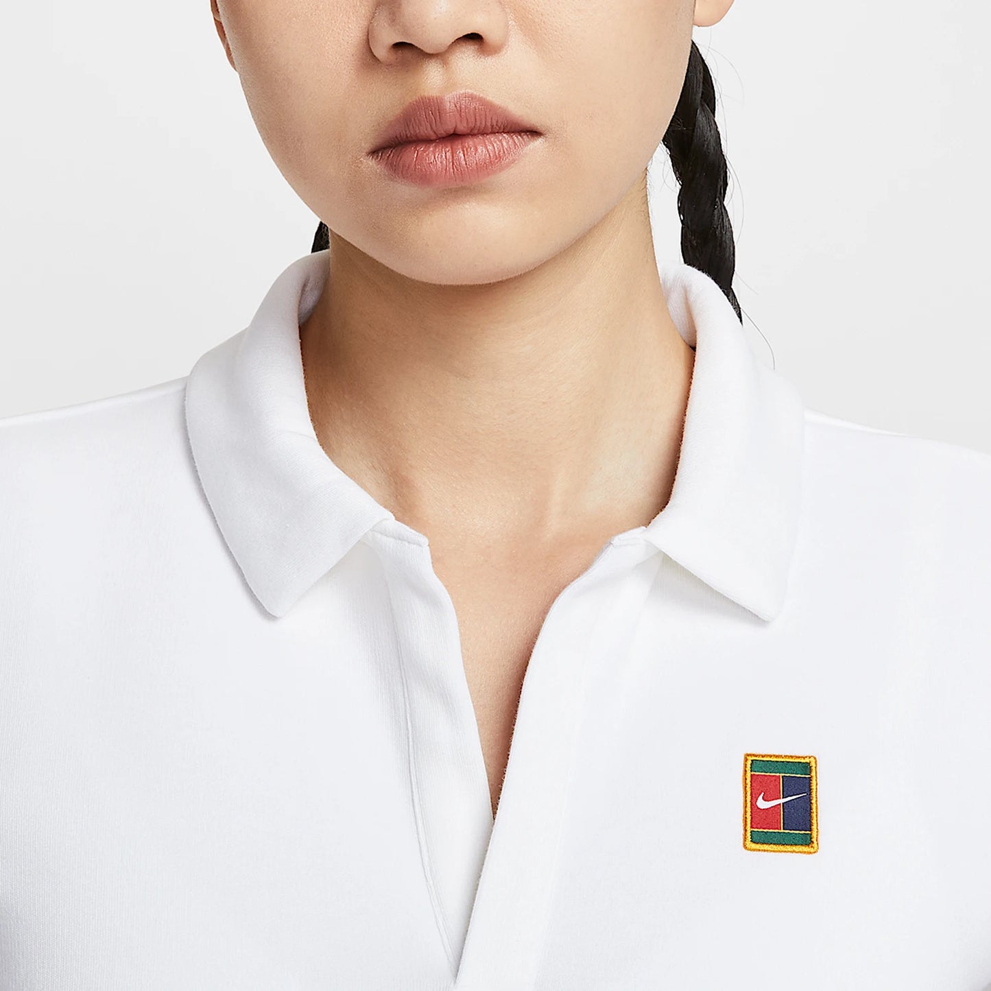 Genuine Nike women's polo shirt, cropped style.